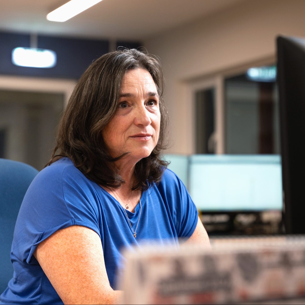 Gail working at her desk